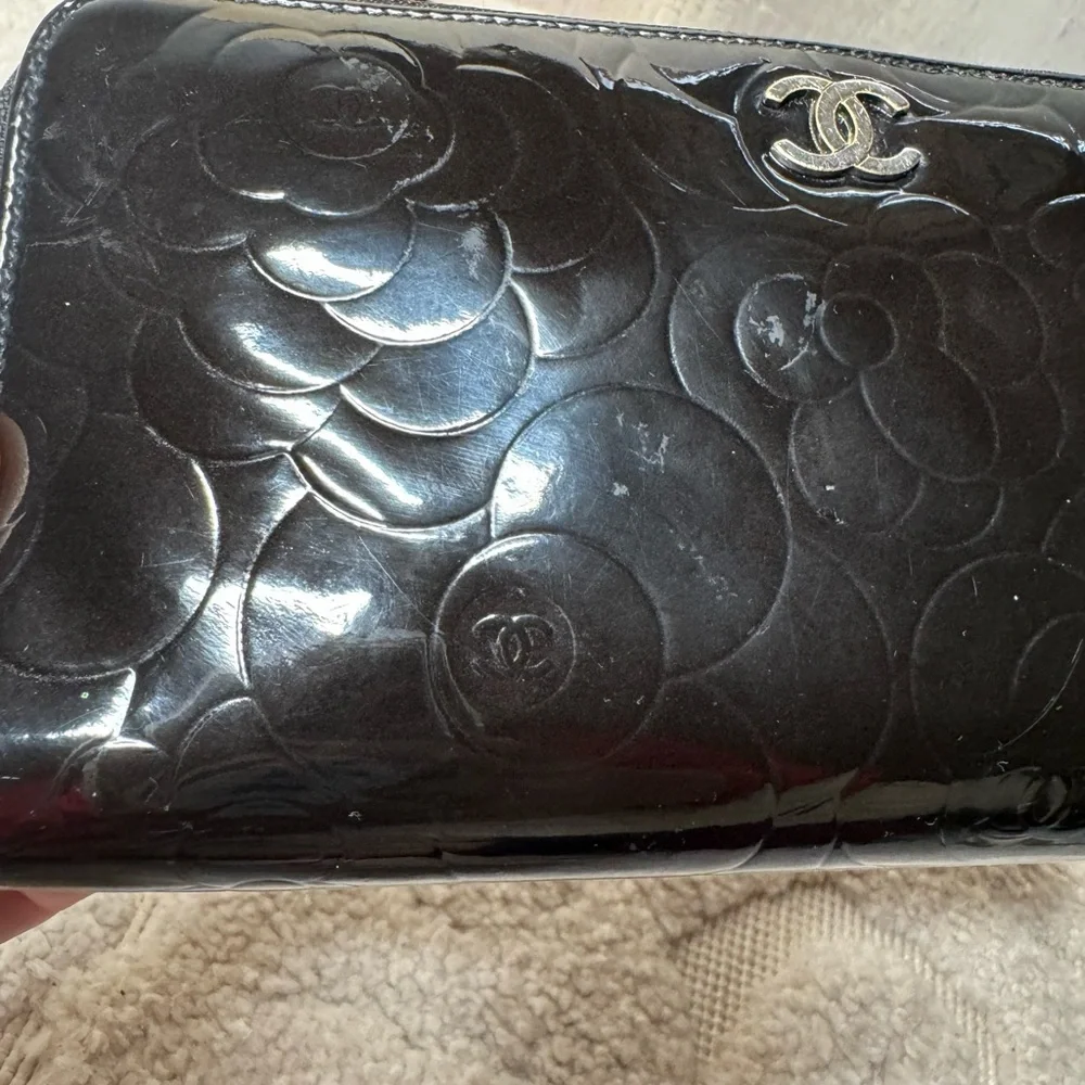 Authentic  Chanel Camelia patent leather zip around‎ wallet long